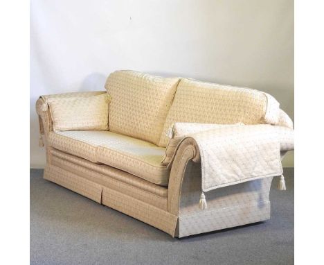A gold upholstered three seater sofa, with loose cushions, by Rhodabourne upholstery245w x 84d x 95h cm