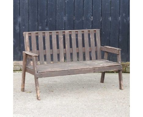 A wooden garden bench, 135cm wide