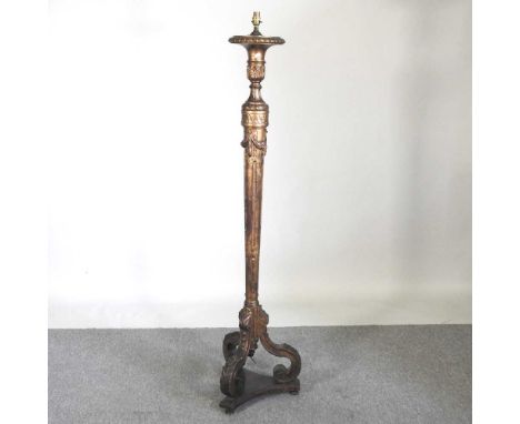 An early 20th century ornate continental gilt standard lamp, 160cm high
