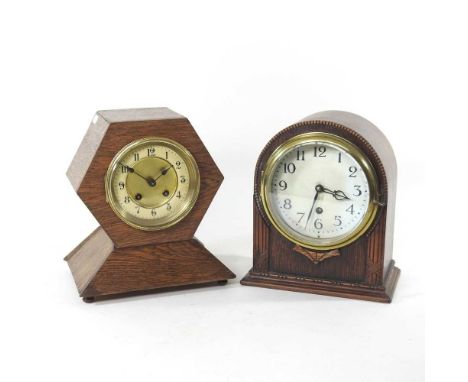 An early 20th century oak cased mantel clock, together with another (2)
