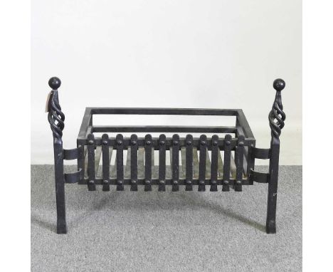 A black painted cast iron blacksmith-made fire grate70w x 40d x 50h cm