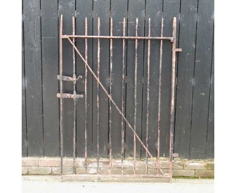 A wrought iron gate, 152cm high109w x 152h cm
