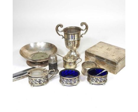 A silver table cigarette box, together with a silver part condiment set, silver and plate
