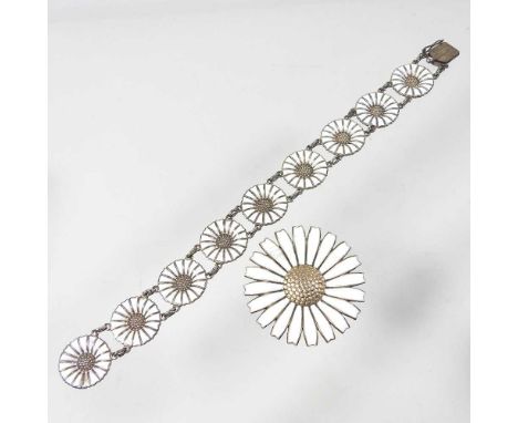 A Georg Jensen silver and enamel daisy brooch, designed by Anton Michelsen, stamped marks, 42mm diameter, boxed, together wit
