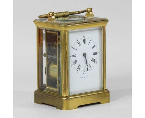 An early 20th century brass cased carriage clock, the white enamel dial signed H. Rodrigues, with push repeat, striking on a 