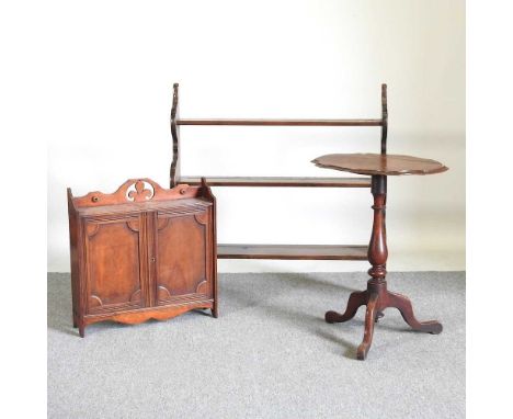 A 19th century tripod table, together with a three tier wall shelf and an Edwardian hanging cabinet, 57cm wide (3)