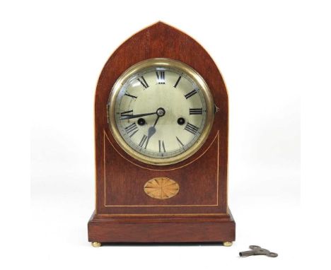 An early 20th century walnut and inlaid bracket clock