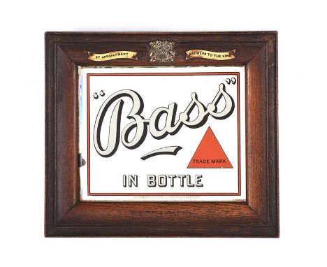 BASS ADVERTISING MIRROR IN AN OAK FRAME STAMPED BASS & CO LTD. BY ASSORTED BREWERS TO THE KING.11½ X 13 INCHES.IN GOOD CONDIT