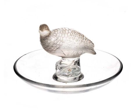 LALIQUE GLASS TRINKET DISH WITH BIRD SURMOUNT.STAMPED CRYSTAL LALIQUE FRANCE TO BASE.HEIGHT: 2 INCHES.DIAMETER: 4 INCHES.IN G