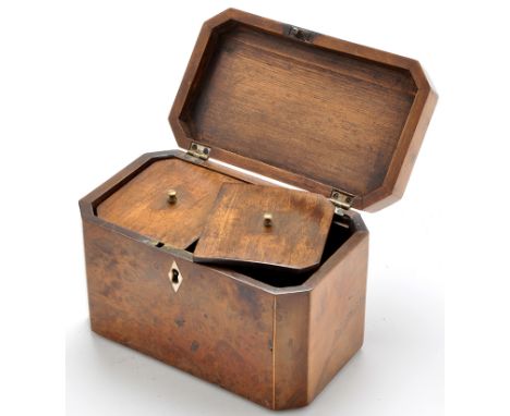 A George III burr walnut tea caddy, of canted rectangular form with boxwood stringing, the lid opening to reveal two covered 