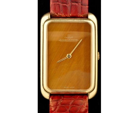 Jaeger LeCoultre: an 18ct yellow gold cased wristwatch, with tigers eye signed dial, the case back stamped '9725.21, 1.409.85