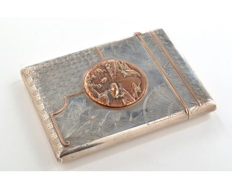 A Victorian silver visiting card case, by Charles Faraday & Samuel Davey, London 1883, with circular Japanese style panel wit