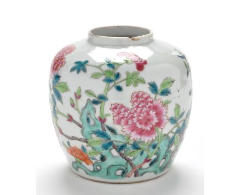 Chinese Famille Rose jar, painted with floral blooms amongst rockwork, 19th Century, height 13cms.