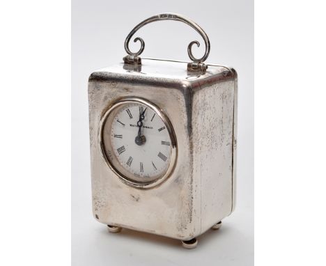 An Elizabeth II silver cased miniature carriage clock, by Matthew Norman, London 1982, cased, with key and instructions bookl