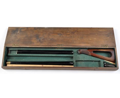 A muzzle loading air cane, by G.E. Lewis, Birmingham, with screw-out barrel and ramrod attached to a brass finial, black re-e