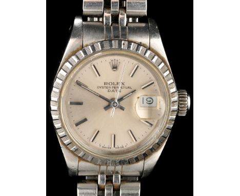 Rolex Oyster Perpetual Date: a lady's stainless steel wristwatch, with silvered baton dial, model and serial no. 69240/R54193