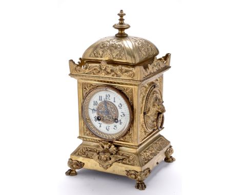 A late 19th Century French giltmetal mantel clock, with enamelled arabic dial, French drum movement striking on a gong, archi