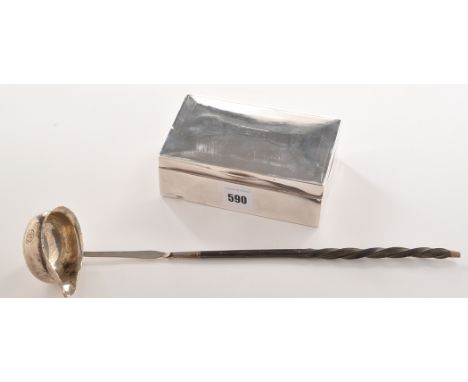 A Georgian white metal toddy ladle, with stained twisted whalebone handle, engraved initials; and a George VI engine turned c