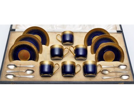 Limoges blue and gilt ground coffee set, comprising six coffee cups and saucers, six silver coffee spoons, boxed, box length 