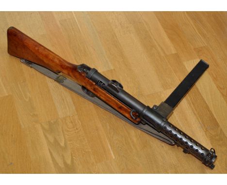 A Lanchester Mark I 9mm sub-machine gun, the magazine housing marked with name and model above "SA. M619 31369 A", fitted sta