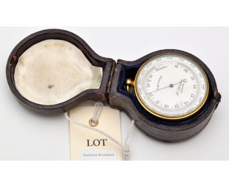 A 19th Century combination pocket barometer, thermometer and compass, by F. Kuhn, Luzern, in a gilt metal case, the leather-c