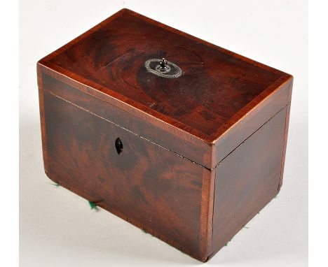 A George III mahogany rectangular tea caddy, decorated with boxwood stringing and rosewood crossbanding, the hinged lid with 