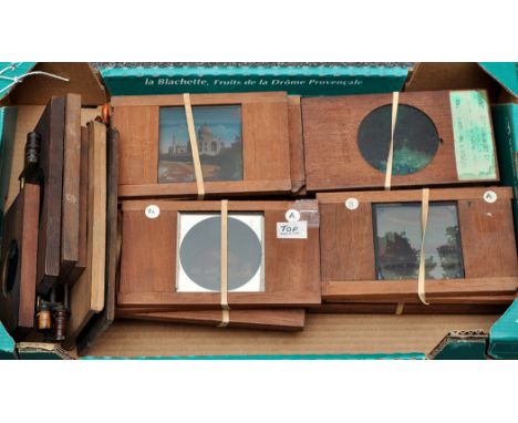 A small quantity of mechanical magic lantern slides; together with nine dissolving view sets. (30)  