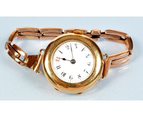 A 15ct yellow gold cased ladies cocktail watch, the white enamel arabic dial fitted crown wound mechanism, on yellow metal fl