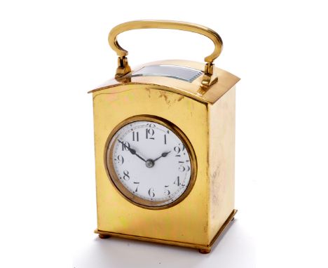 A French late 19th Century brass carriage clock, with circular enamelled arabic dial, platform lever escapement, in arched ca