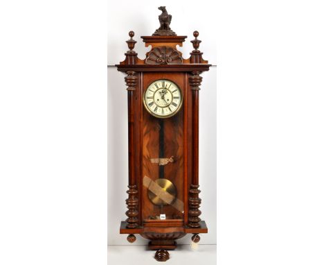 A Vienna style walnut wall clock, the enamelled roman dial with subsidiary seconds dial and signed 'W.S. Tarson, South Shield
