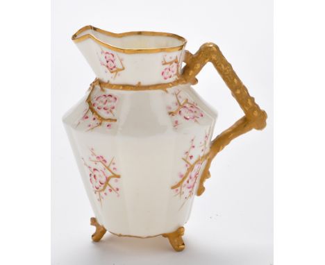 Belleek 'Japanese' jug, simulated branch handle with prunus blossom, late 19th Century, height 16cms, impressed marks; 'Sevre