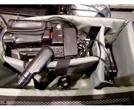 Mitsubishi VHS movie camera with bag. All electrical items in this lot have been PAT tested for safety and have passed. This 