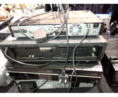 Mixed DVD players and a VHS recorder including Toshiba. All electrical items in this lot have been PAT tested for safety and 