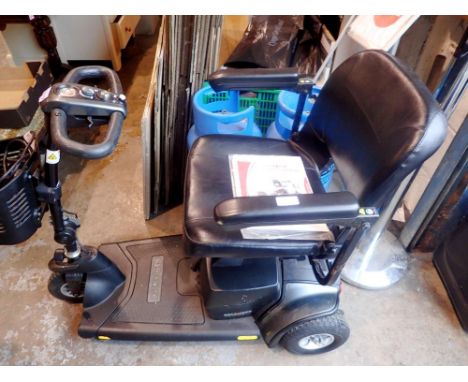 GoGo Elite traveller plus mobility scooter with manual, rain cover, battery and charger, not working at lotting. All electric