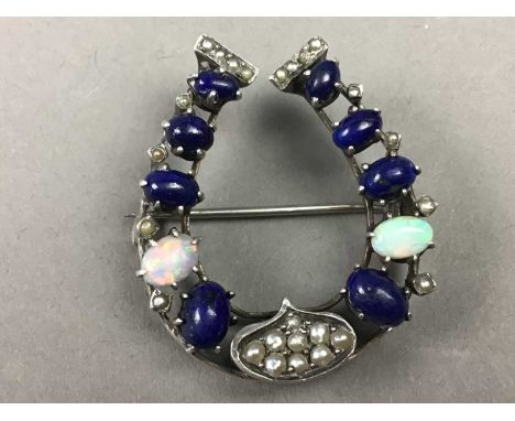 SILVER HORSESHOE BROOCH,set with lapis lazuli and opal, along with silver locket