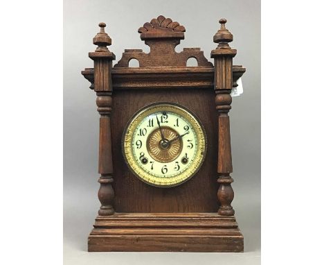LATE 19TH CENTURY OAK BRACKET CLOCK,with gilt metal and cream enamel dial, the striking movement by Ansonia Clock Co, New Yor