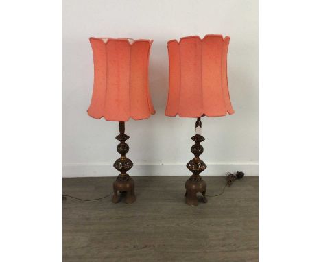 PAIR OF CHINESE DESIGN TABLE LAMPS,with pierced scroll decoration and bell shaped bases, with shades, each 90cm high overall 