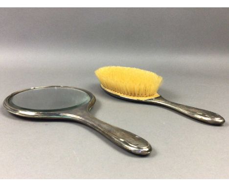 EARLY 20TH CENTURY SILVER VANITY SET,comprising a hand mirror and brush, and a comb mount, in fitted case