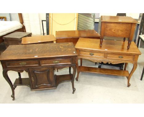 A 19th century carved hardwood side table with two drawers, on cabriole legs, 105cm wide, a matching wash stand, an ebonised 