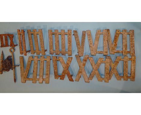 A part-set of metal clock golf Roman numerals stamped F H Ayres, (number I missing), 17cm high. 