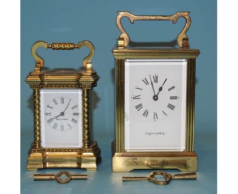 Mappin &amp; Webb, a brass-cased carriage timepiece, 11cm high, 15cm high overall, (chip to front glass panel), together with