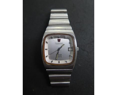 A vintage Omega Constellation electronic stainless steel wristwatch with date, 35mm case, some usage marks consistent with ag