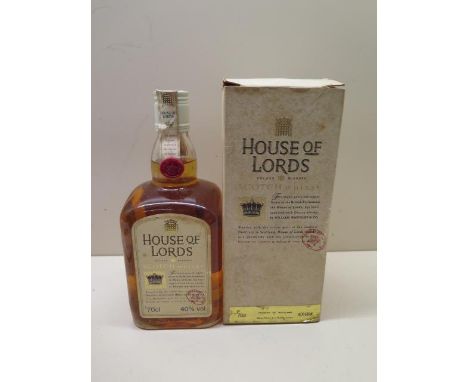 A 70cl 40% V bottle of House of Lords Deluxe blended Scotch whisky by William Whiteley &amp; Co with outer box, level good 