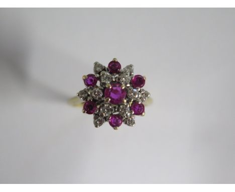 A 9ct yellow gold diamond and ruby cluster ring, size M/N, approx 5 grams, head approx 14mm (7298) 