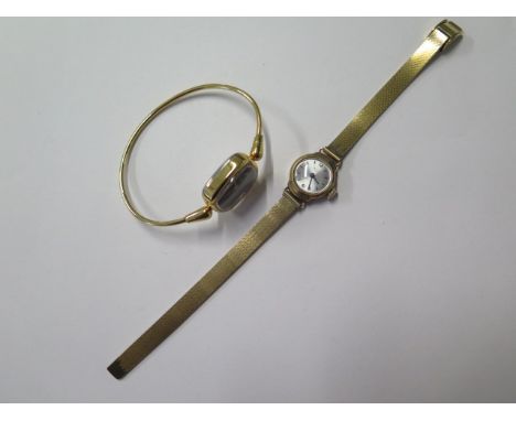 A 9ct manual wind Avia ladies watch on plated strap, total weight approx 18 grams, running, and a plated manual wind Vogue ba