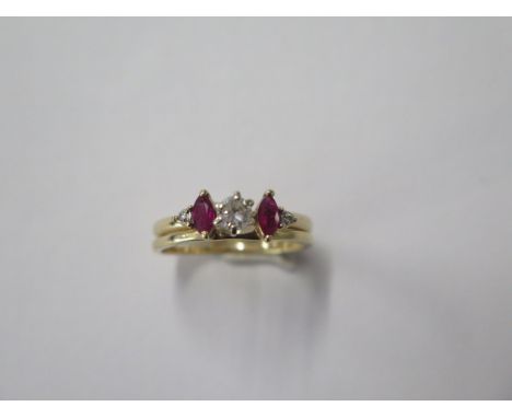 A 14ct gold diamond and ruby two part ring with the solitaire approx 0.20ct, size M/N, approx 3.2 grams in generally good con