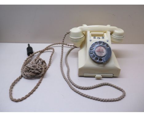 A cream bakelite 300 series vintage telephone with drawer, case and handset in good condition, some small scuffs, cord good, 