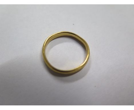 A hallmarked 22ct gold band ring, size J/K, approx 2.4 grams 
