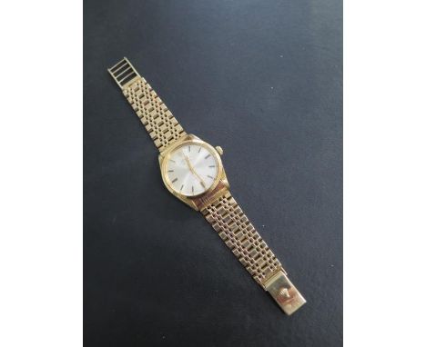 A Rolex 14ct yellow gold Oyster Perpetual Air King precision wristwatch on a Rolex hallmarked 14ct yellow gold strap model 55