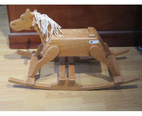 A vintage pine rocking horse, 58cm tall x 96cm long 